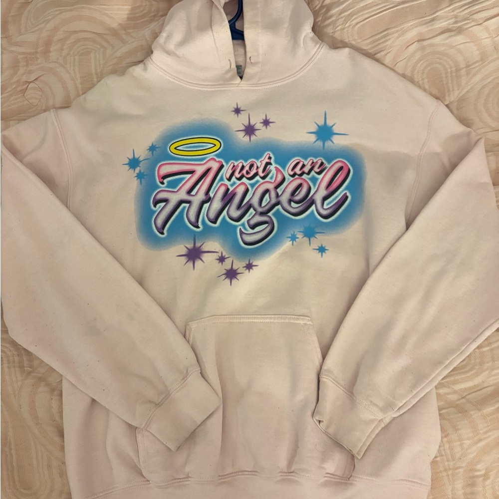 Light Pink Hoodie with 'Not an Angel' Graphic